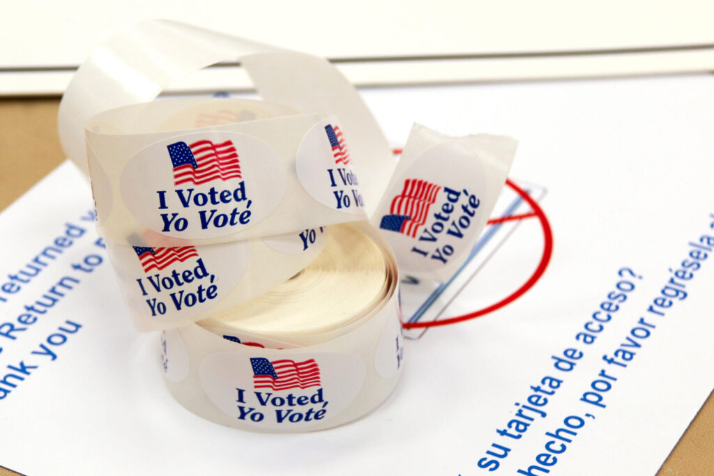 A roll of "I Voted"/"Yo Voté" stickers.