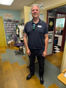 Rob Rominiecki smiling in the WSLR lobby.
