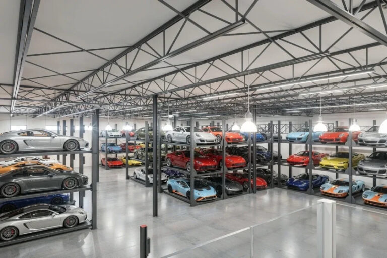 AI rendering of luxury cars parked in display towers.