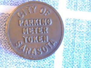 A City of Sarasota Parking Division vehicle parked on the side of the road.