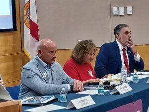 Jim DeNiro, Julie London and Joe Neunder at a panel.