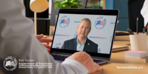 Ron Turner speaking on a laptop screen.
