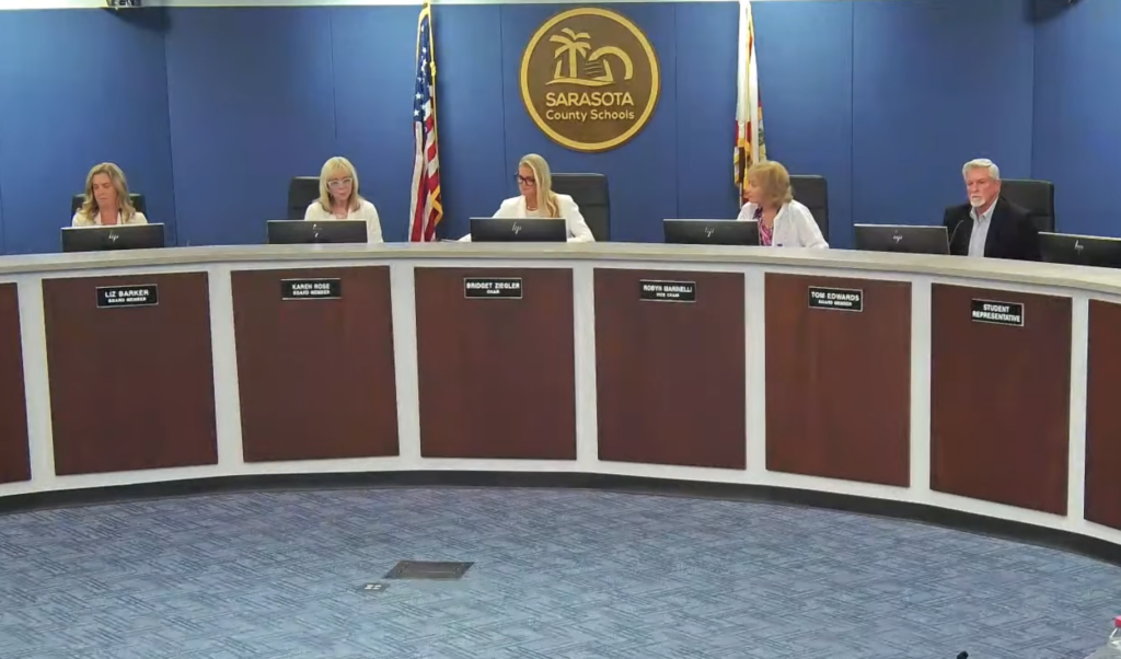 Liz Barker, Karen Rose, Bridget Ziegler, Robyn Marinelli and Tom Edwards in the Sarasota School Board meeting room.