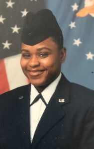 Tamika Lyles smiling in a U.S. military dress uniform.