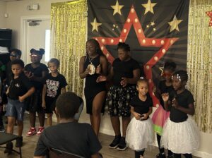 Students perform for an audience.