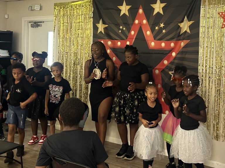 Students perform for an audience.