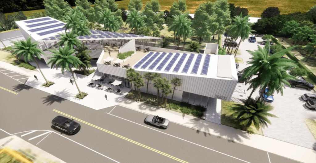 Rendering of a contemporary building with solar panels on the roof surrounded by palm trees.