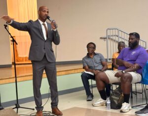 Kyle Battie addressing a crowd.