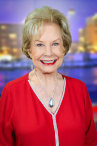 Linda Carson smiling.