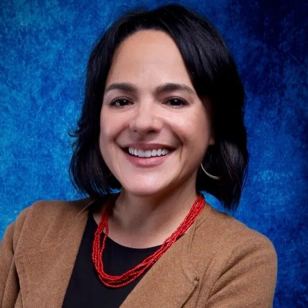 Lisa Gonzalez Moore smiling.