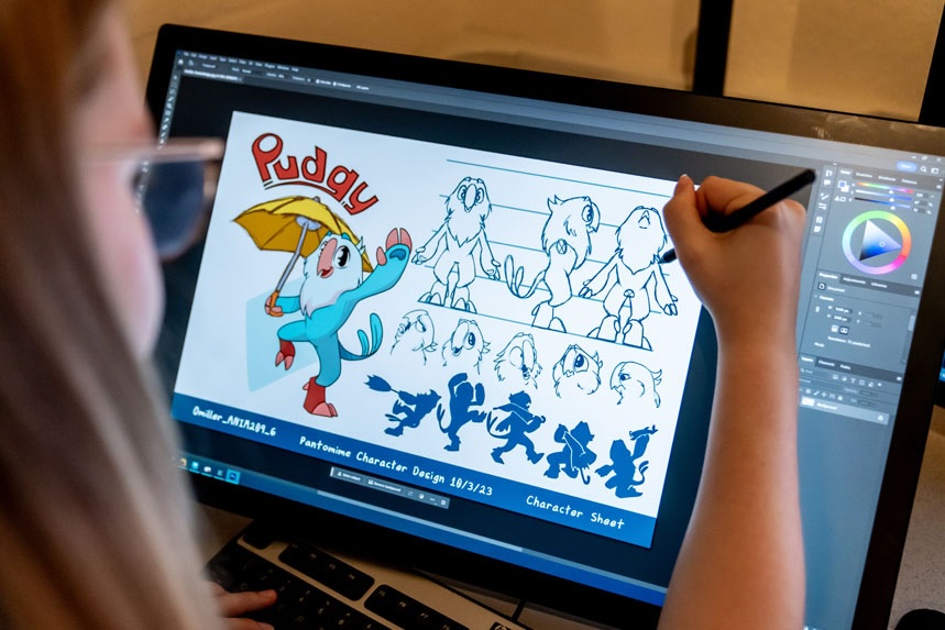 An illustrator working on a character sheet for an anthropomorphic birdlike character named Pudgy on an art tablet.
