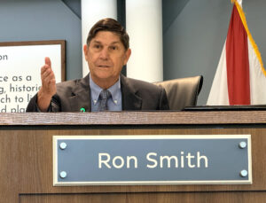 Ron Smith gesticulating while speaking.