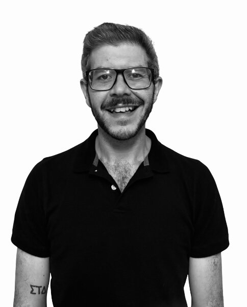 Black and white photo of Thomas Schwarz smiling.
