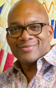 Trevor Harvey smiling.