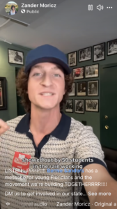 Still frame of a short video for social media by Zander Moricz of him speaking, captioned "showed out by 50 students in the rain working".